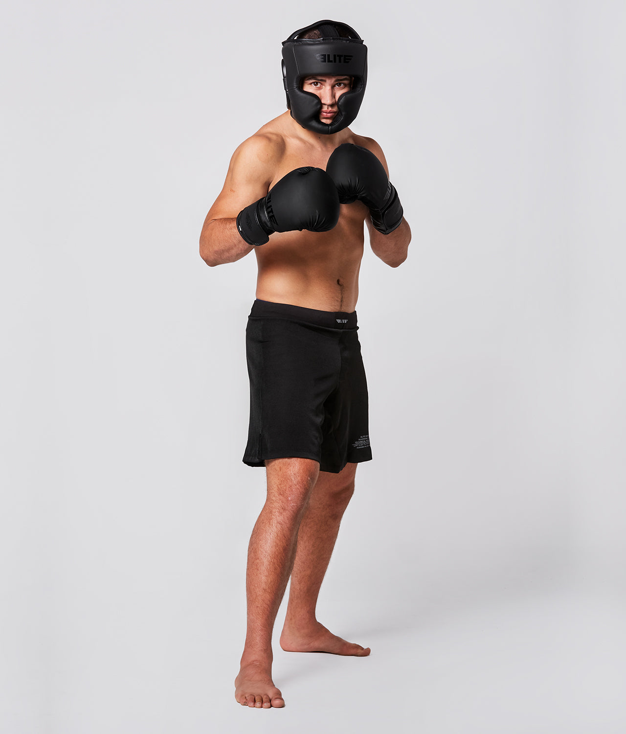 Elite Sports Adults' Black/Black Muay Thai Headgear  Action