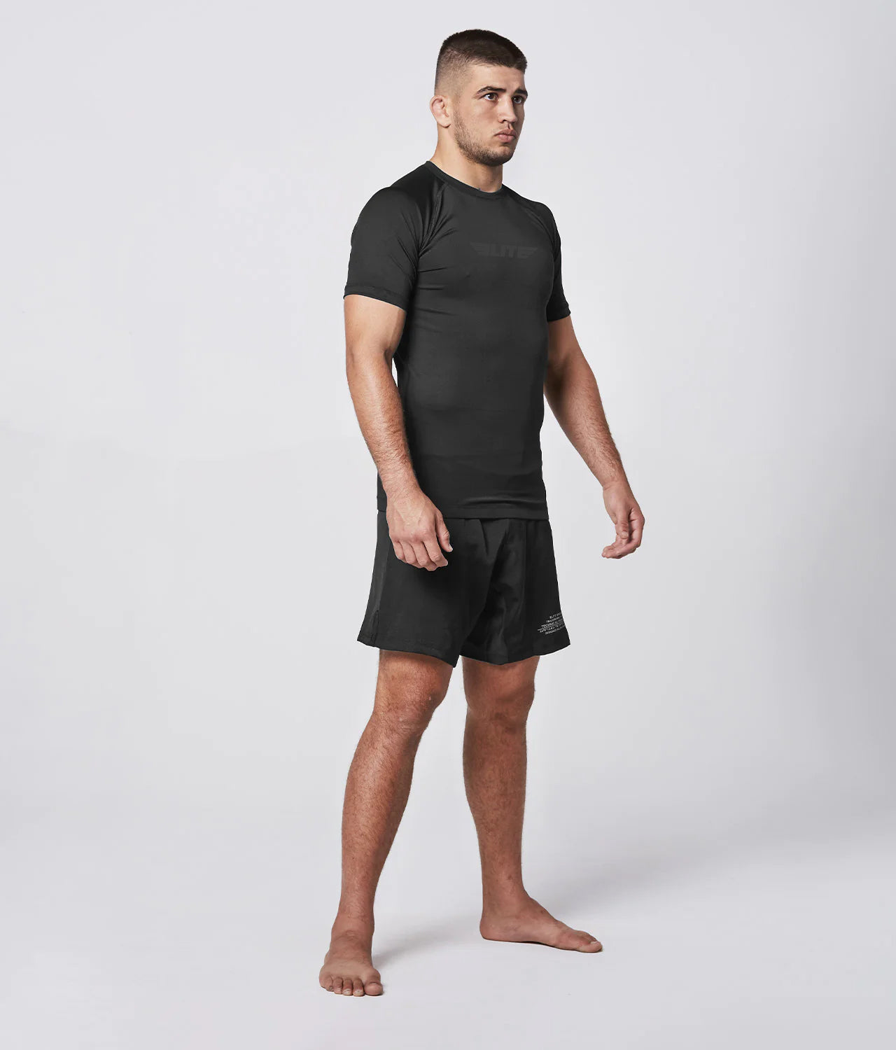 Elite Sports Men's Standard Black Short Sleeve Jiu Jitsu BJJ Rash Guard Side View
