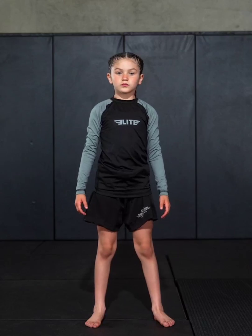 standard black long sleeve kids bjj rash guard video demo