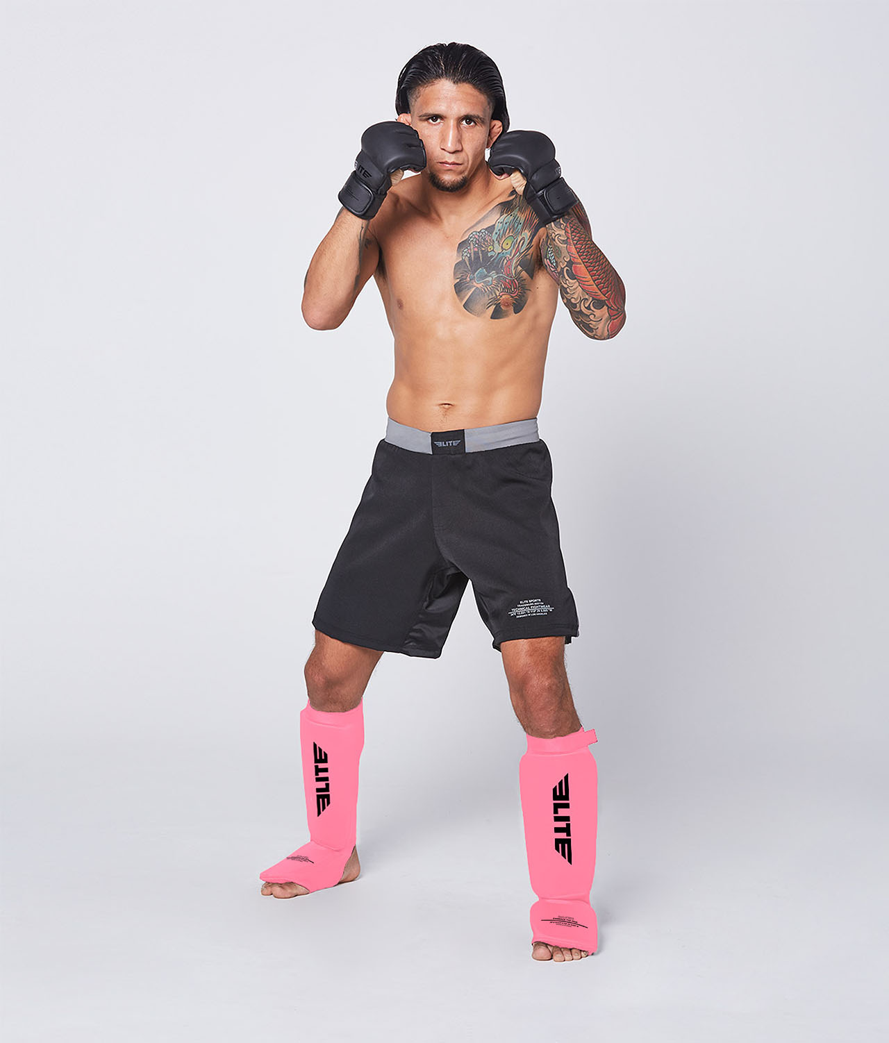 Elite Sports Adults' Standard Pink MMA Shin Guards Action