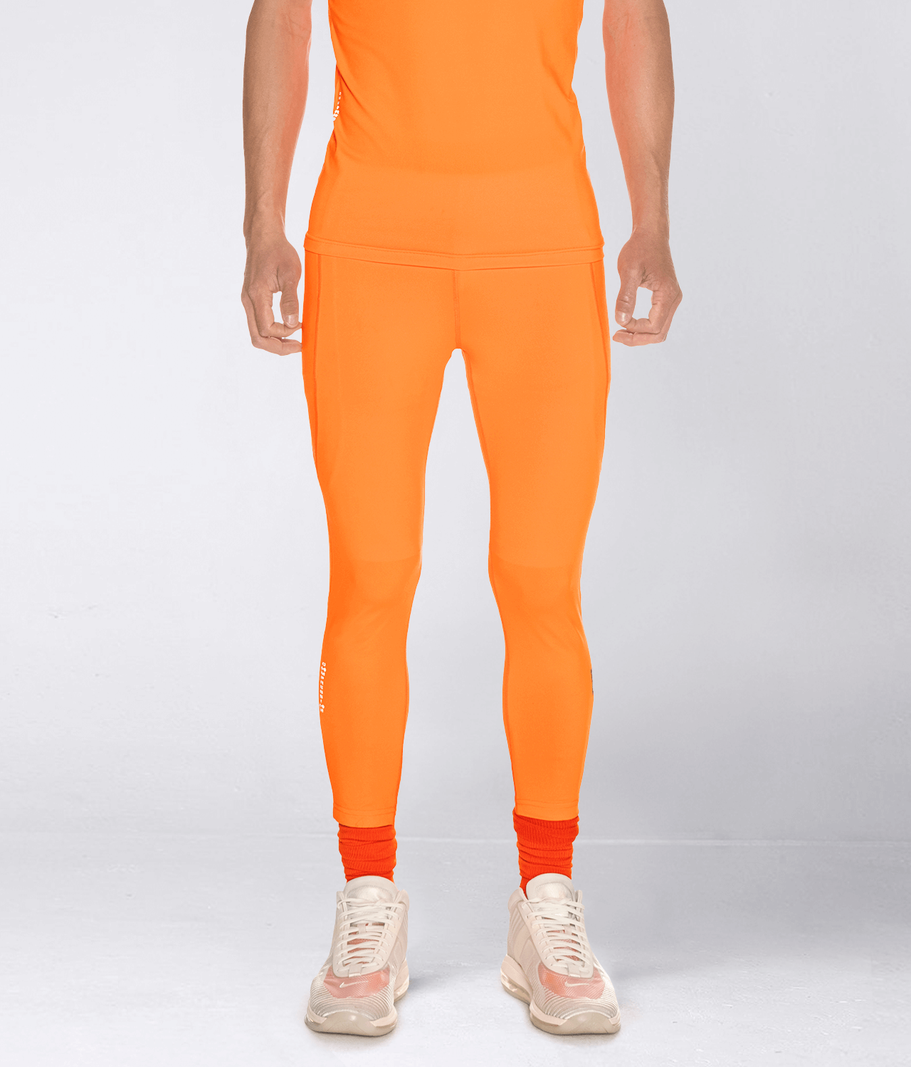 https://www.elitesports.com/cdn/shop/products/born-tough-side-pockets-compression-pants-for-men-orange_1_8f49c6ee-6c54-491e-b0a9-af8cc79e024f.png?v=1643385269